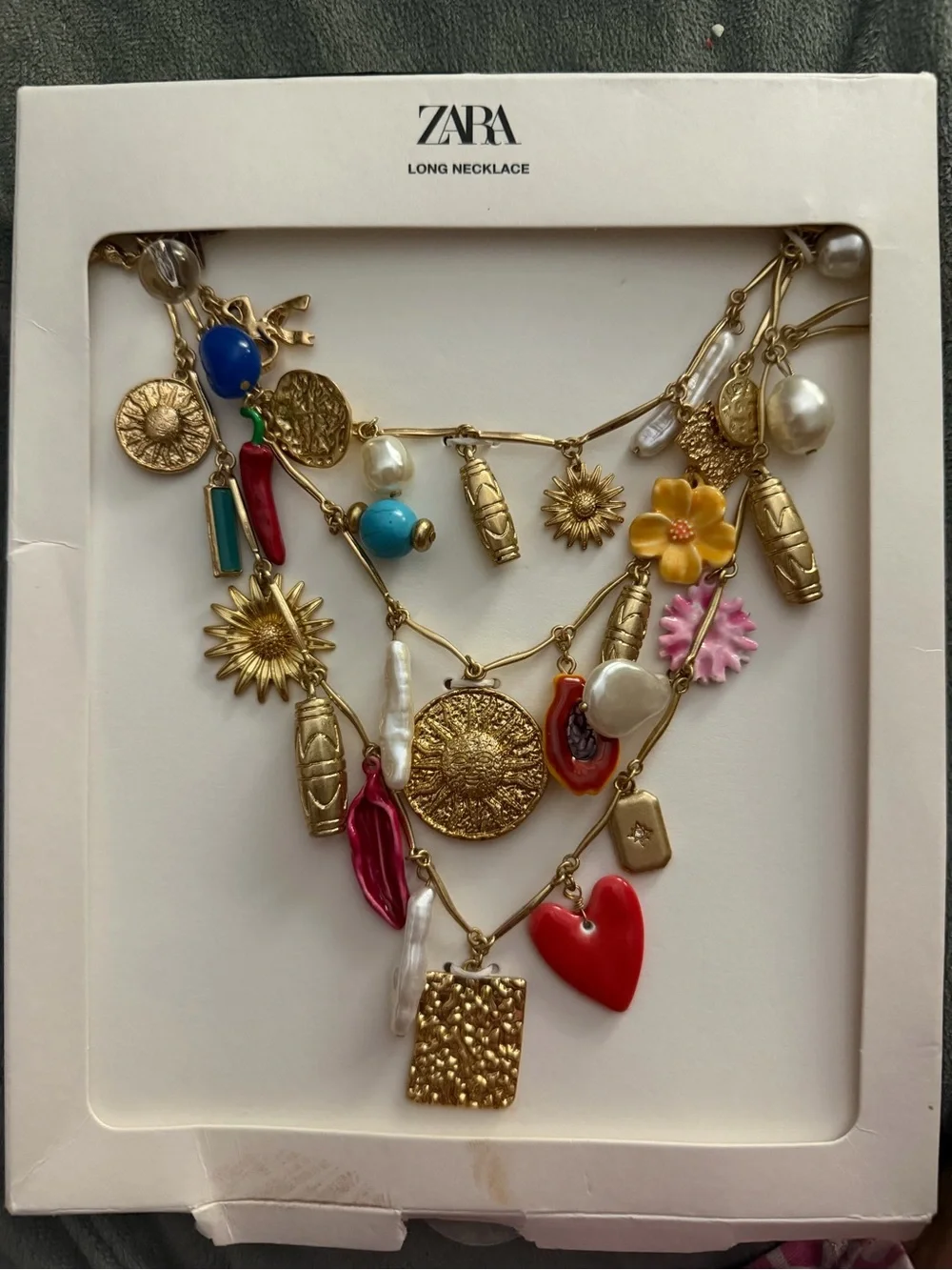 Zara Gold Multi-Charm Layered Necklace with Red, Blue and Pink Accents - Picture 6 of 7